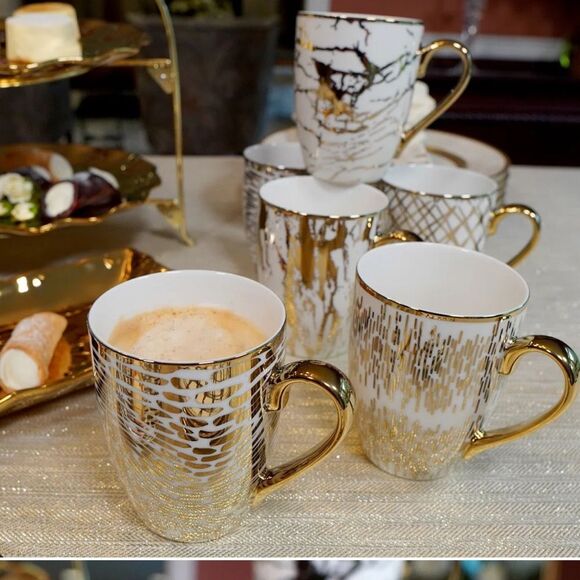 Certified International
4 Piece gold  Multi-Colored Porcelain 16 oz. Mug Set - Picture 8 of 11